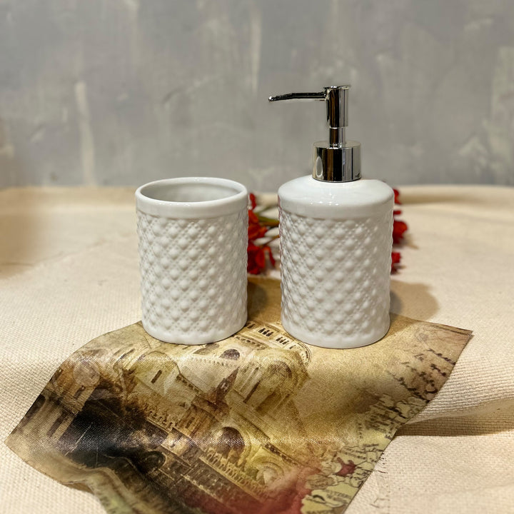 ceramic off white lotion bottle and tumbler for bathroom