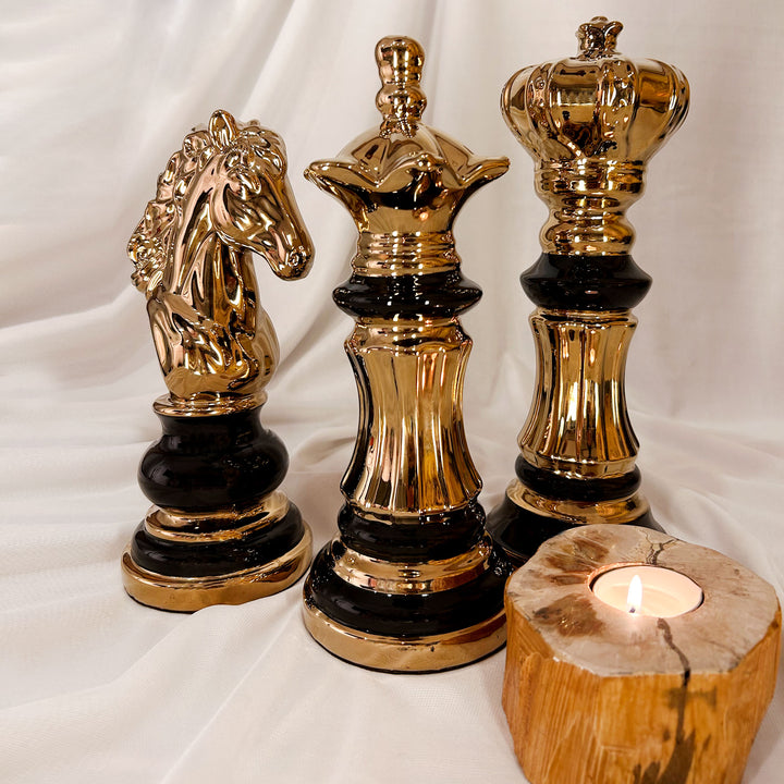 gold and black ceramic chess set for decor