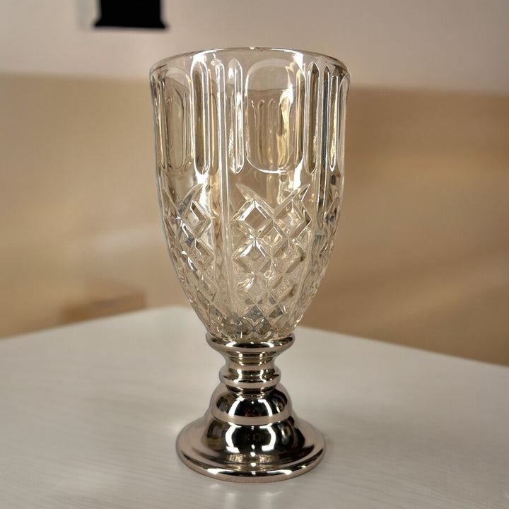 Glass vase with metal stand. 